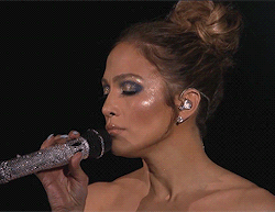cryingfangurl:  diancie:baby-chinchilla:mtvstyle:J.Lo’s American Idol performance dress (and make up) literally has left me speechlessDamn jloMagical   Holy frickle frackle