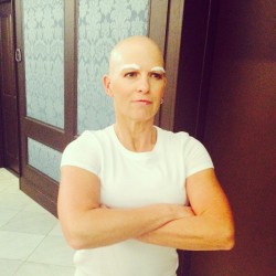 stunningpicture:  My aunt who is battling breast cancer entered a costume contest as Mr. Clean and obviously won  Great job. ..