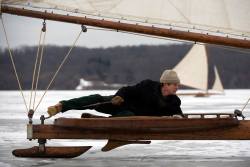 thesorrowsofgin: darkrustic:  Reid Bielenberg racing his ice yacht VIXEN, which was built in 1885 by the Merritt brothers of Carthage (now Chelsea), NY. Ice boating is alive and well in New York’s Hudson Valley:  Hudson River Ice Yacht Club ~  The Sorrows