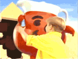 sniffing:never-let—it-die: liquidatomicgonads:  The Kool-aid man destroys the last remaining ancient wonder of the world to give a kid a sugary drink.  This is the most 90s thing I’ve seen in years 