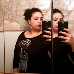 Ima be me baby. Sweater from @cultureproject earrings from @naturalgirlsrock #naturalhair #bluelips #bluenails