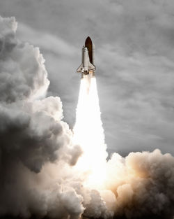 bobbycaputo:  How One Photographer Took Incredible Close-Ups of Space Shuttle Launches Shuttle launches are audacious displays of smoke, steam, and a gigantic man-made vessel being thrust into space. Documenting in-the-moment details can be tricky—the