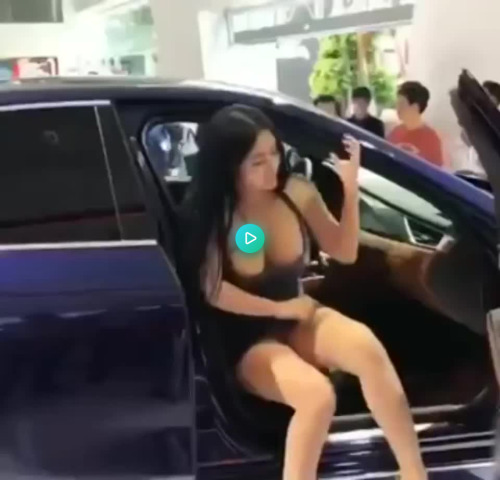 Vietnamese Model Nipple Tease at Vietnam Car Show - GIF