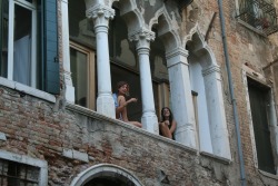 perruh:glittakid: i saw these two girls while riding a gondola in venice. they were smoking and chatting on their windowsill, waving at passing boats. i thought they were incredibly lucky; i would love to share an apartment with my friend or sister in
