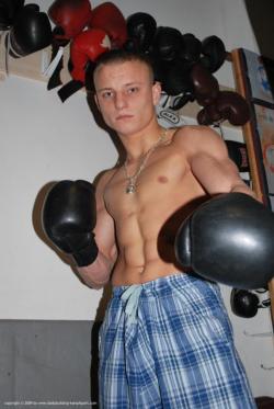 britishbootedbastard:  Lad finds boxing glove heaven to eat leather  Woof