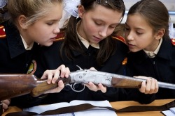 wailtothethief:  softspell:   “The Moscow Girls’ Cadet Boarding School is one of the new elite military academies in Russia. While most kids hate school for boring maths or history, the classes here include stripping down an AK-47 Kalashnikov rifle.