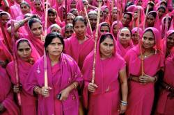 angrymuslimah:  &ldquo;Gulabi Gang&rdquo; is a gang of women in India who track down and beat abusive husbands with brooms. 