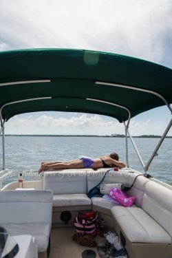 theadventuresofaandk:  I am not going to listen to you constantly whine about how you can’t do anything on the boat since we put you in a diaper. Yes, you’re in a diaper, and no you’re not allowed to put back on your shorts, but that doesn’t mean