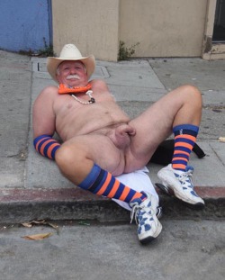 Mr Smiles naked at Folsom Street Fair spreading his legs for everyone&rsquo;s enjoyment.