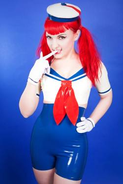 candyvalentina:  Some more Sailor Trixie for you! Original character art by Andrew Hickinbottom artImage by justine-louise PhotographyLatex by catalystlatexHair dye by Manic Panic UK