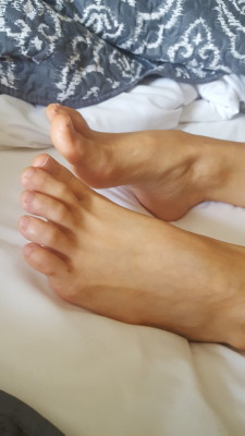 myprettywifesfeet:  My pretty wifes sexy natural toes and nice high arch.please comment