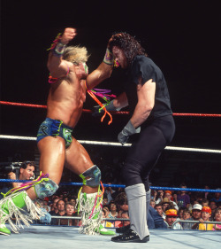 alex-g-goldsmith:  The Ultimate Warrior vs The Undertaker  2 of the most epic gimmicks out there, never to be replicated.