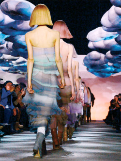   Set designer Stefan Beckman met with Marc Jacobs mere weeks before his fall show to brainstorm ideas for a set that would complement his designs. The result was a room filled with fluffy, cloud-shaped pillows suspended from the 110-foot ceiling of the