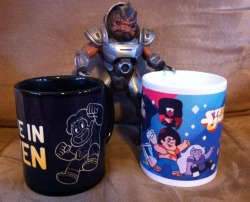 My Steven Universe stuff arrived! :D I got two of the mugs and a phone case (the phone case actually came yesterday but I wanted to post them together.)  I posed my Grunt figure with the mugs for no real reason, it just amused me to do so.