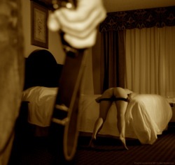 dominantpleasures:  The side of her face was pushed into the pillow. Her arms were extended beyond her head, tied with a necktie bound to the wrought iron headboard. Her head was turned to look back but she couldn’t see but a blur through the necktie
