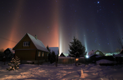 nubbsgalore: atmospheric light pillars are created by the reflection of light - here from artificial suburban light - off millions of flat hexagonal plate shaped ice crystals that have become horizontally aligned as they float in the freezing cold air
