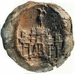 coolartefact:  The minoan object called “ The Master’s Seal” depicts a multistore building complex above the hill of Kasteli and a figure of a young man, perhaps a worshiper. Chania of Crete - 1600 BC Source: https://imgur.com/38fyxh9