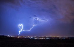love:    Heart-shaped lightning formed during a thunderstorm over France.