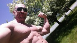 gastlouis:  bigjoetex:  Imagine finding him next door?  Muscle Daddy Danny Garon likes to mow in his posing strap.   All the beefy you dream of… and above in my case P.S. I swallow until the last drop man’s proteins 