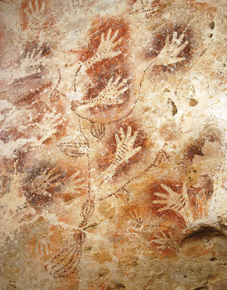 ancientart:  Hand-stencil rock art from Gua Tewet, Borneo, thought to be over 10,000 years old.Photo courtesy of Luc-Henri Fage, via the Wiki Commons.