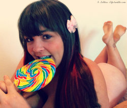 a-lolitas-life:  A Little treat for my awesome-sauce followers! xoxo, Lolita  (Picture - My Lollipop &amp; Me - A Lolitas Life) *** Lollipop - Randy Behavior I want to be a lollipop A swirling twirling bright confection Tightly bound in a cellophane