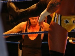 rwfan11:  CM Punk and Undertaker ….“Are you trying to seduce me Mr. Punk?” …….and is that a very tiny, slight , piece of buttcrack Punk is giving us? Perhaps it’s a shadow and I’m just horny!…but I think it is the tip of a beautiful booty
