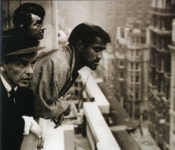 dinosaysthatsamore:  Dean Martin, Frank Sinatra, and Sammy Davis Jr. look out into the busy streets of the city.
