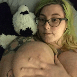 myrtlemoon:  Hanging out with my panda buddy in bed.