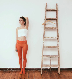 razumichin2:A ladder, a coat hanger and a girl in orange tights