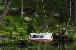 mymodernmet:  Swing Rest by Daniel Pouzet A hanging couch that offers the ultimate relaxation of a swing to lounge on in nature. 