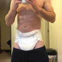 rocket42787:  Another quick vid of me changing out of gym clothes.  Nothing too special,  just a glimpse.  A few people in the locker room. One is seen walking by. I didn’t care.   so damn hot!