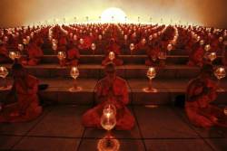 Ad infinitum (Buddhist monks pray at the Wat Phra Dhammakaya temple, north of Bangkok, on Makha Bucha Day. The day honours Buddha and his teachings, and falls on the full moon day of the third lunar month)