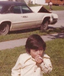 goddess-complex:thisobscuredesireforbeauty:“A  young boy who had just stolen his father’s car and crashed it, takes  one final puff on his cigarette before facing the consequences. (1974).”Source   the 70s were just like that