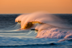 wonderous-world:  Waves Series by David Orias Orias, a Santa Barbara-based photographer, uses a long telephoto lens and low shutter speed to amplify the ocean’s color and textures, collapsing the progression of light over time into a simple image that