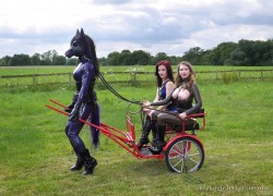 nataliegothtv:NatalieGothtv in Rubber Horse Drawn Cart. Shoot with Mistress Lola Ruin and Mistress T at The English Mansion.