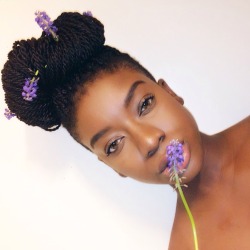 youngnubian:  Melanin, check. Flowers in hair, check. Natural/Protective style, check.   Does this mean I can be black tumblr famous now? LMFAO.