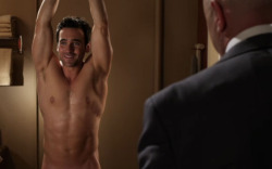 Allan Hawco shirtless and showing his pits.