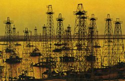 trefoiled:  Offshore oil derricks, Galveston Bay, Texas. Cover of The South Central States, Time-Life Library of America, 1967 by Lawrence Goodwyn.
