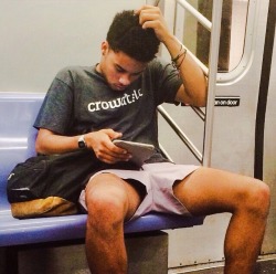 upshorts-n-more:  shorts-and-underwear:  Open legs shorts in metro  Wow… oblivious to the allure of it all. Sweet!