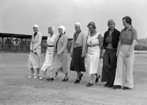 blondebrainpower:A group of female race drivers at Brooklands, 1937.Brooklands was a 2.767-mile motor racing circuit and aerodrome built near Weybridge in Surrey, England, United Kingdom. 