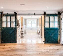 stylish-homes:  100-year-old carriage doors open onto the master bathroom in this home in Vermont. via reddit   House goals!