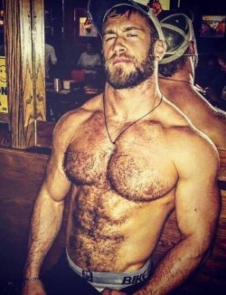 Pecs, fur and washboard abs.