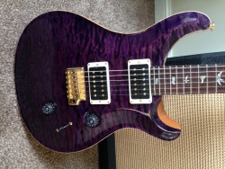 guitar-porn:  PRS CU24. Like A Ridiculously Hot Purple Tiger. &ldquo;My PRS CU24 quilt, 10 top, gold HW, 59/09 pickups and headstock signed by Paul instead of the usual logo.&rdquo; - Luke Smale 