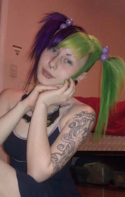 porphyriasuicide:   I really like my new colors. If Joker and Harley had a baby (besides Duela Dent??) I think it’s hair would look like this. Phenomenal   