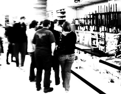Customers in gun shop