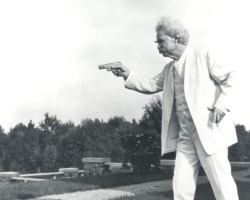 sexhaver:  peashooter85: Mark Twain with his Colt Model 1903 pistol, 1908.  i cant stop thinking about this picture. the stance. the white suit. the way the gun looks like he’s just making a gun symbol with his fingers. the way his eyebrows are more