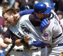 siphotos:  On this day in 2006, Michael Barrett shows his displeasure at A.J. Pierzynski by punching him in the face. The incident igniteed a bench-clearing brawl between the White Sox and Cubs which led to a 15-minute delay and four ejections during