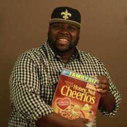 moonblossom:  mooserattler:  Reblog this picture of me holding a Family Size box of Honey Nut Cheerios? I’d really appreciate it.  How can I say no to such a great photo and such a polite request? 
