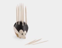 escapekit:  Hedgehog ToothPick Holder The MOMA Store (Museum of Modern Art) just released the Kipik Toothpick Holder for online sales. Designed by Erwan Péron in 2011, this little Hedgehog made out of wood will fit perfectly on any plate you’ll