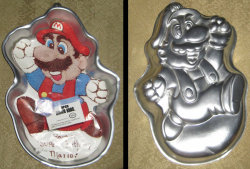 avaneanime:  A collection photo of a Mario cake pan by Wilton. Vintage Nintendo Mario Cake Pan by ~avaneshop